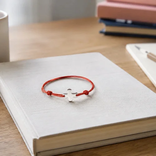 Bracelet élastique orange fluo avec croix | Comptoir Religieux