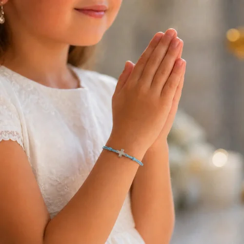 Bracelet élastique bleu ciel avec croix | Comptoir Religieux