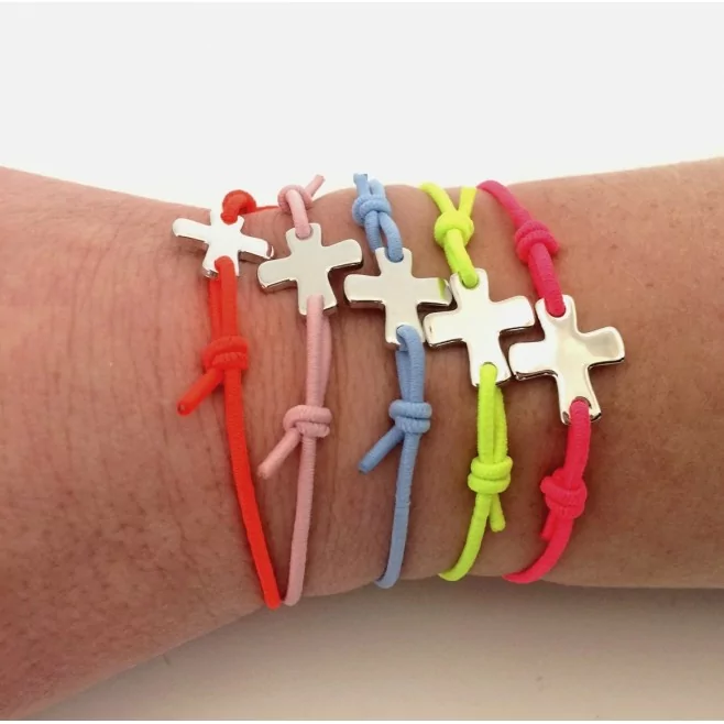 Bracelet élastique rose fluo avec croix