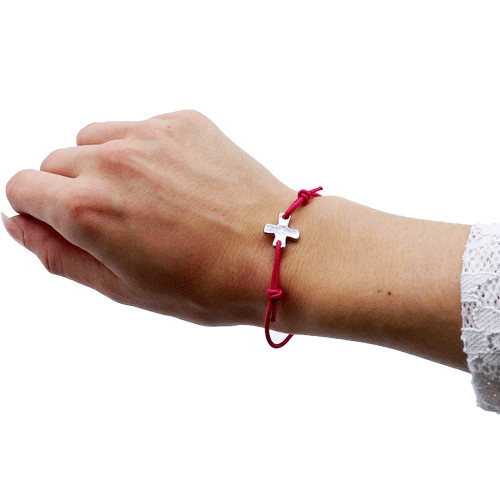 Bracelet élastique rose framboise avec croix