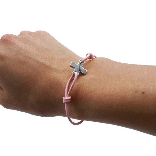 Bracelet élastique rose avec croix
